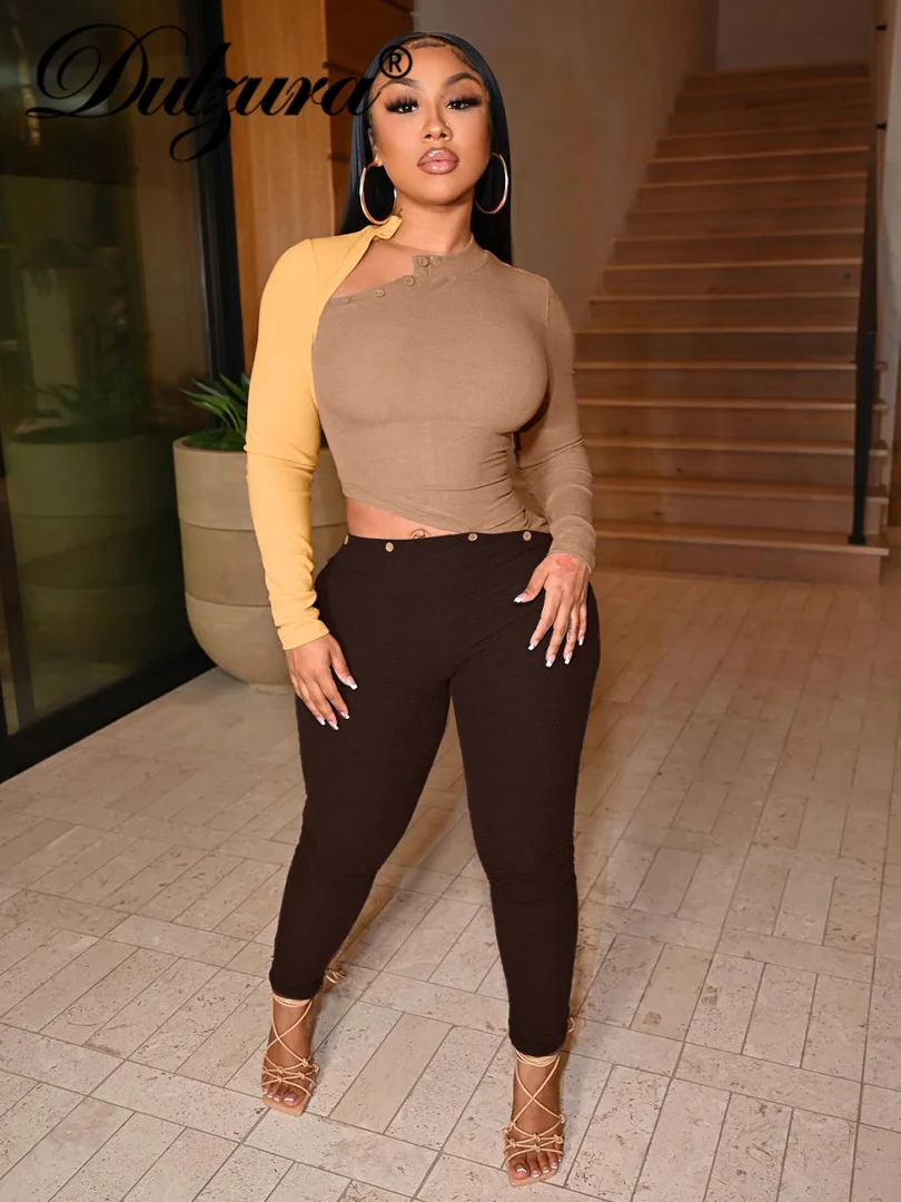 

Dulzura Buttons Patchwork Women Ribbed Long Sleeve Hollow Out Jumpsuit Skinny Sexy Streetwear Casual Rompers 2021 Winter Clothes