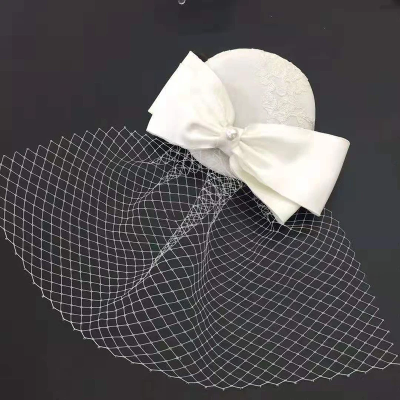 100% Ручная работа Женская федора Шляпа Федоры Платье Фасцинатор Льняное войлоковое Пиллбокс Партийные головные уборы Элегантная свадебная лук Вуаль LM071.