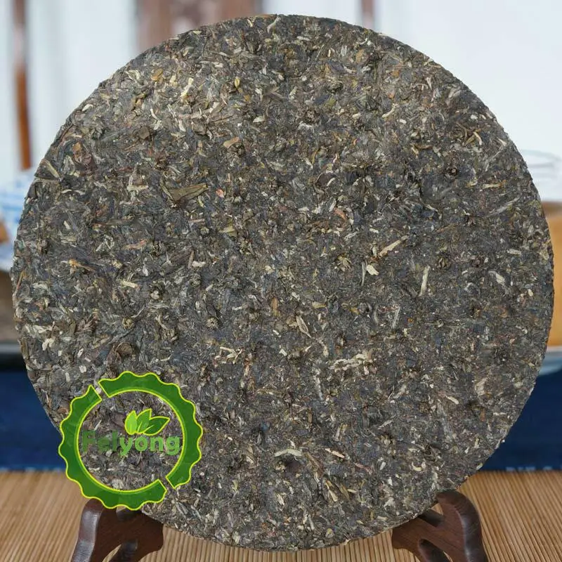 чай пуэр Xia Guan 2014 Shen Pu erh Юньнань Гао Юань Чэнь сырой Чай Железный торт 357