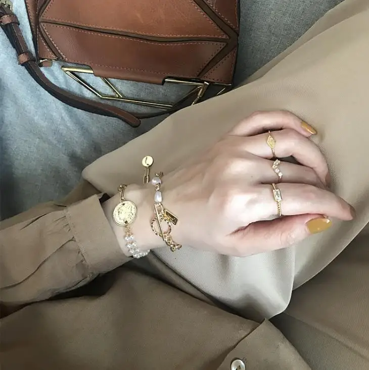 HUANZHI 2019 nouveau или l humaster visage барокко perles lien браслеты для женщин fille браслет |