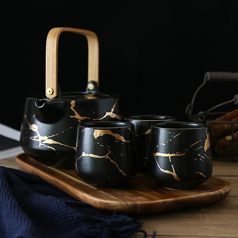 

Japanese-style black and white ceramic household tea set marmoring afternoon tea with mangium teapot acacia stand base