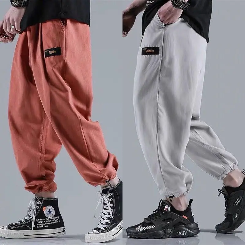 

Hip-hop sports pants summer solid color loose casual pants pull rope tie feet INS super hot men's sports nine points pants