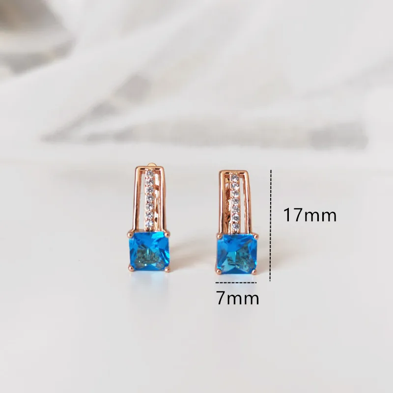 Серьги цвета розового золота 585 пробы с синим цирконом инкрустированные