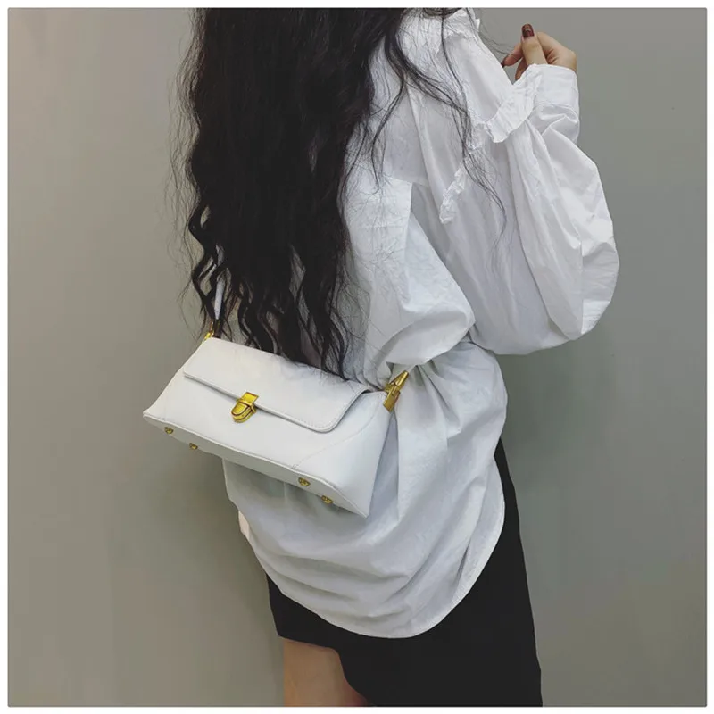 

Women 2021 Soft Leather Baguette Bag Retro Designer Solid Colour Shoulder Bags Long Belt Strap Handbag Metal Buckle Clasp