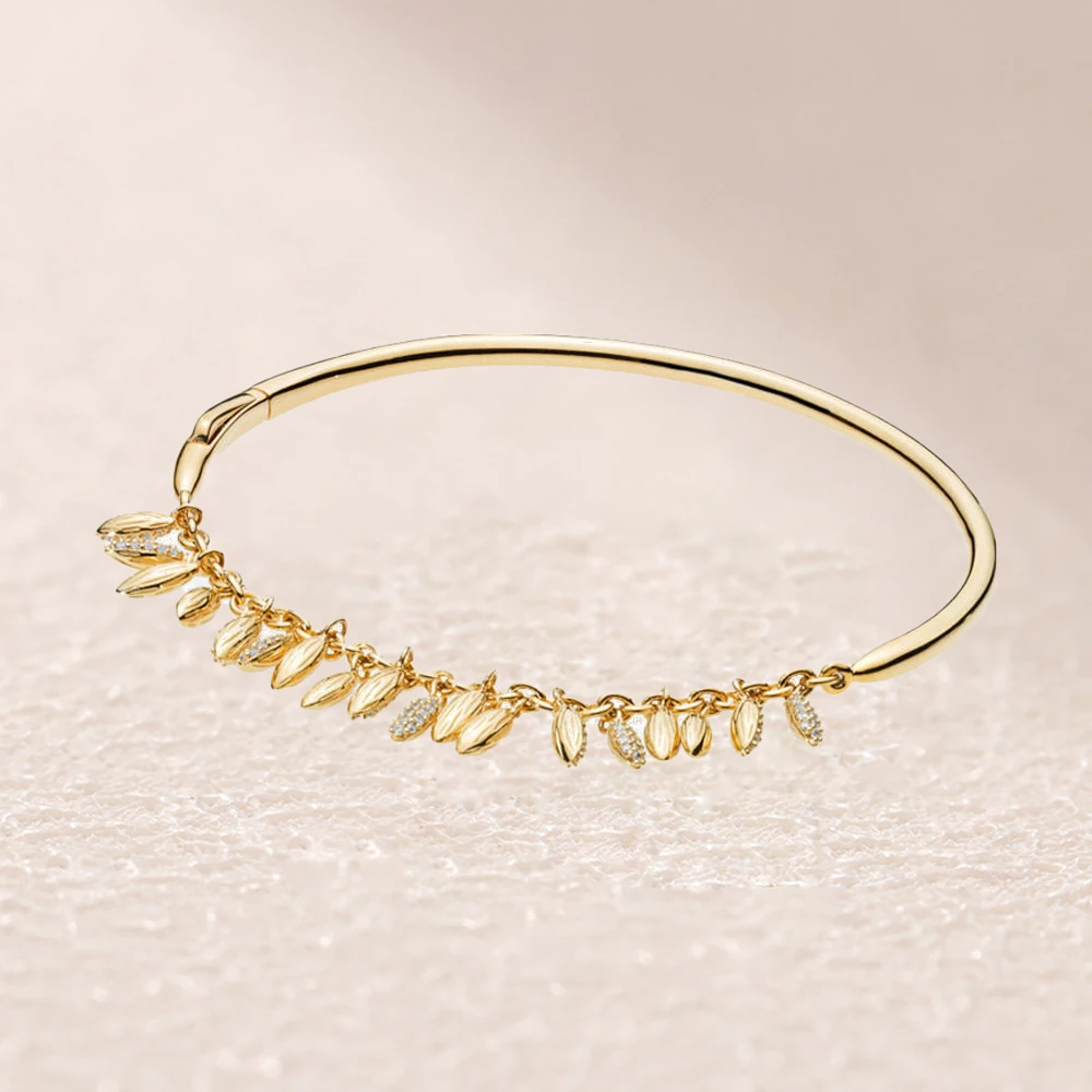 

567715CZ SHINE FLOATING GRAINS BANGLE
