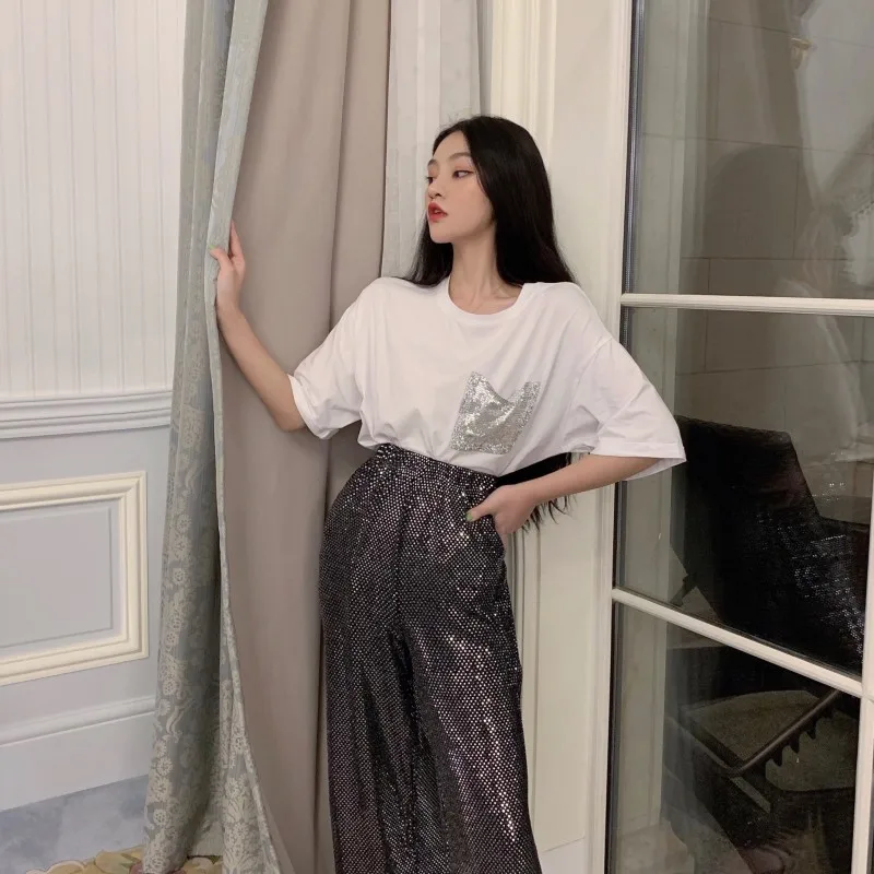 Футболка женская оверсайз с рукавом до локтя круглым вырезом и карманами |