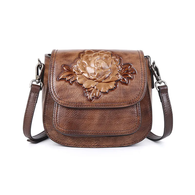 

The new three-dimensional embossed head layer cowhide bag, one shoulder diagonal lady bag, hand rubbed color peony fashion bag