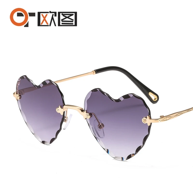 

New frameless thick edge cut Sunglasses peach heart inverted edge wave Sunglasses Women's net red glasses 1616