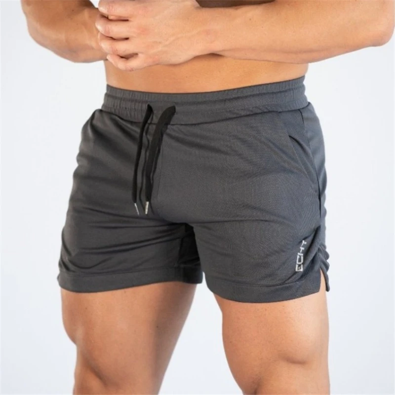 

new men Summer mens shorts Jogger Fitness fashion Casual gyms Joggers workout Bodybuilding Breathable quick-drying Beach shorts