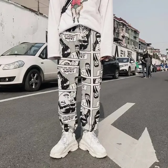 

Man's Fashion Cartoon Comics Print Pants Loose Sport Casual Drawstring Elastic High Waist Joggers Pants Hip Hop Cropped Trousers