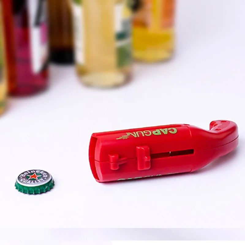 

1PCS Cap Gun Funny Beer Bottle Cap Launcher Kitchen Tools Bottle Opener Shoot Cap 5 Meter Home Bar Party Game Gadgets Cool