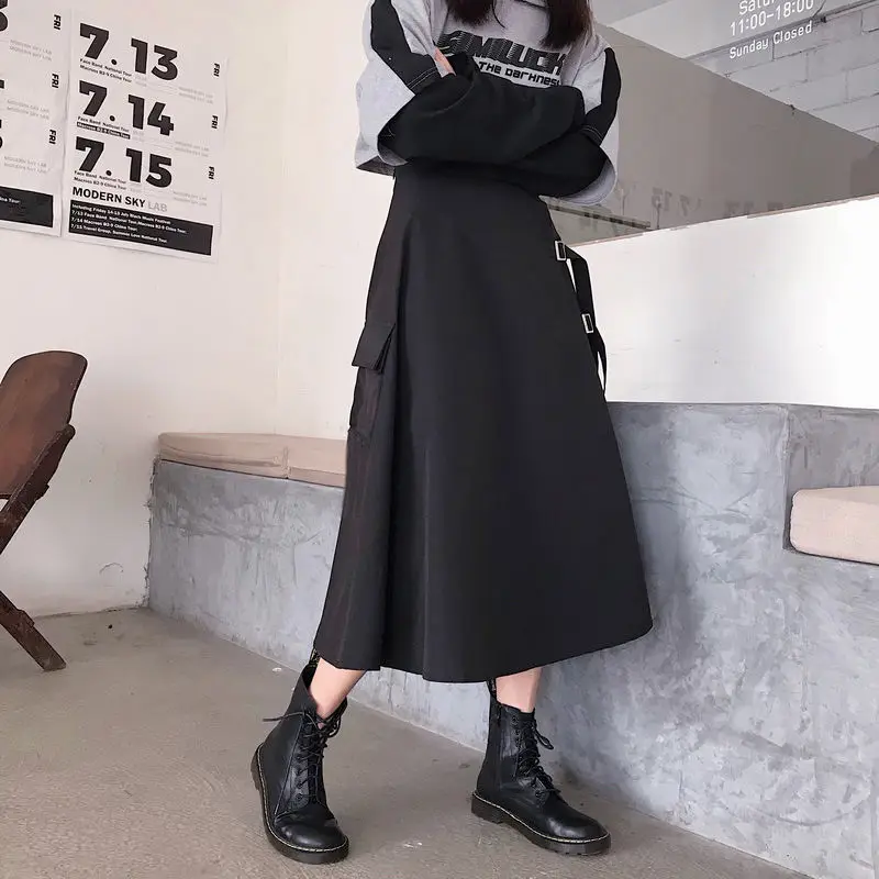 

2021 spring and Autumn New Korean fashion high waist irregular solid color mid length skirt women's A-line skirt umbrella skirt