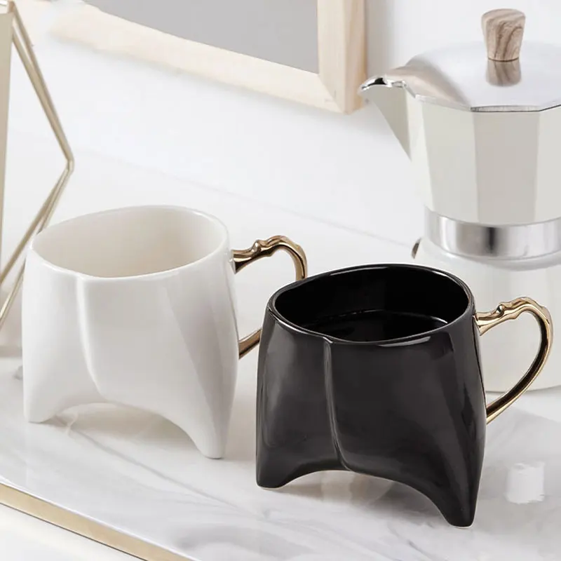 

Creative Shape Bone China Coffee Cups White Black With Gold Handle Porcelain Tea Cup 220ml Drinkware Milk Water Mug Couple Gifts