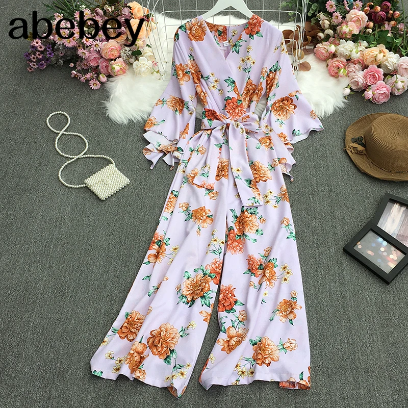 

2021 New Summer Fashion All-match V-neck flared sleeve Jumpsuits waist strap lace up casual wide leg Jumpsuits