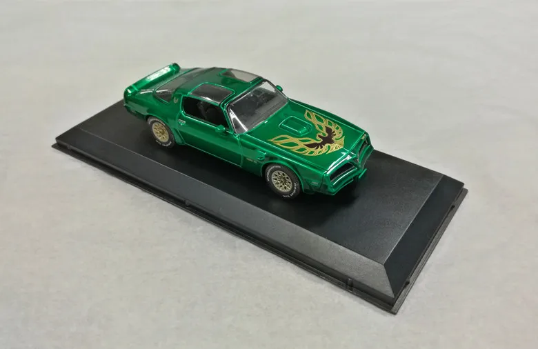Автомобиль GreenLight 1:43 1977 PON TIAC FIREBIRD T/A boutique из сплава игрушки для детей детские