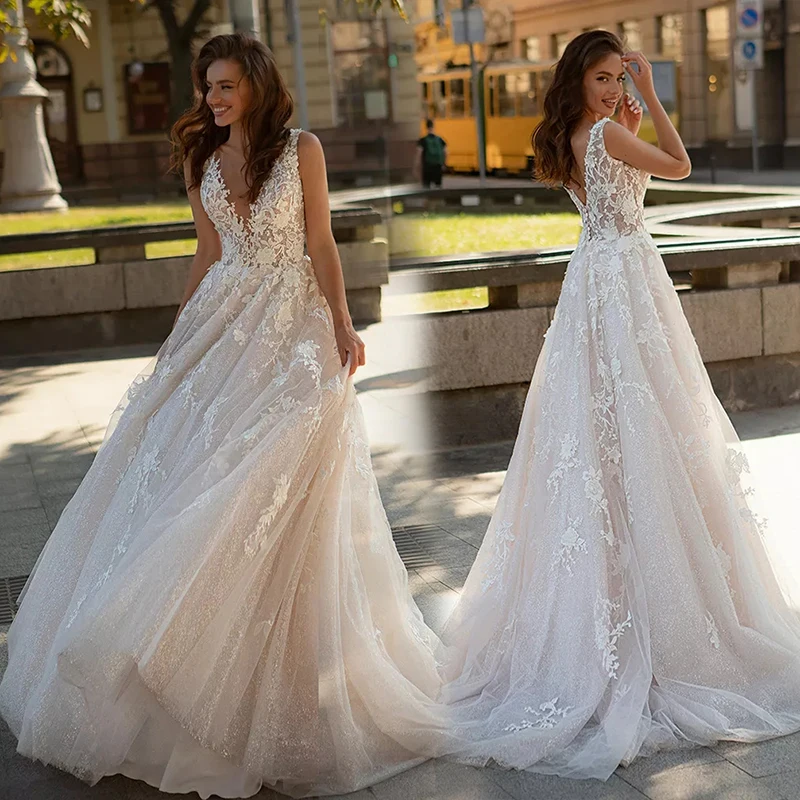 

Скромное Свадебное платье принцессы А-силуэта с V-образным вырезом Кружевная аппликация со шлейфом Свадебные платья без рукавов для невест...