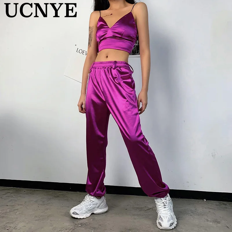 

UCNYE Лето 2020 Повседневный Женский костюм Спортивная одежда Уличная Сексуальная Хип-хоп вечерние Блестящие Брюки лазерные свободные брюки + у...