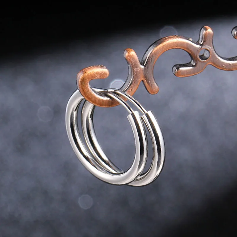 Серьги гвоздики круглые из нержавеющей стали золотого/серебряного цвета 1