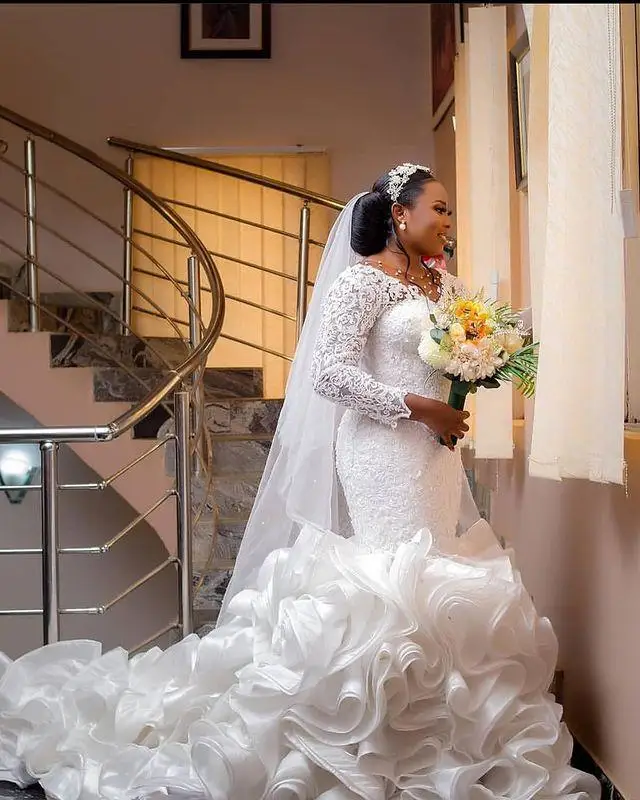 

Arabic Mermaid Wedding Dresses Illusion Lace Appliques Crystal Long Sleeves Ruffles Tiered Organza Chapel Train bridal gown