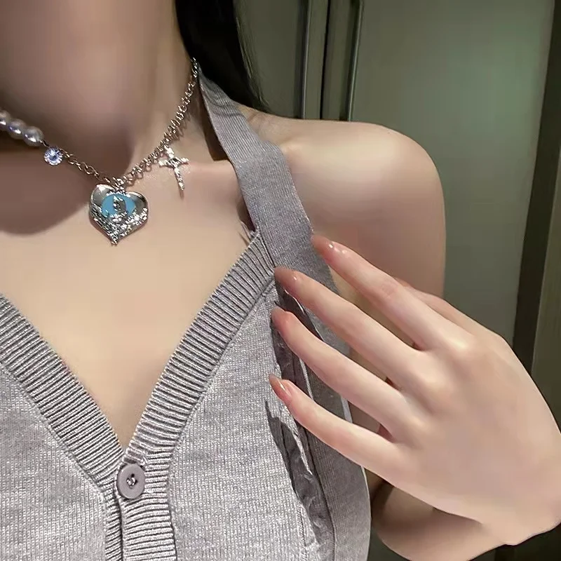 

Ожерелье с подвеской в виде креста с жемчугом и кристаллами