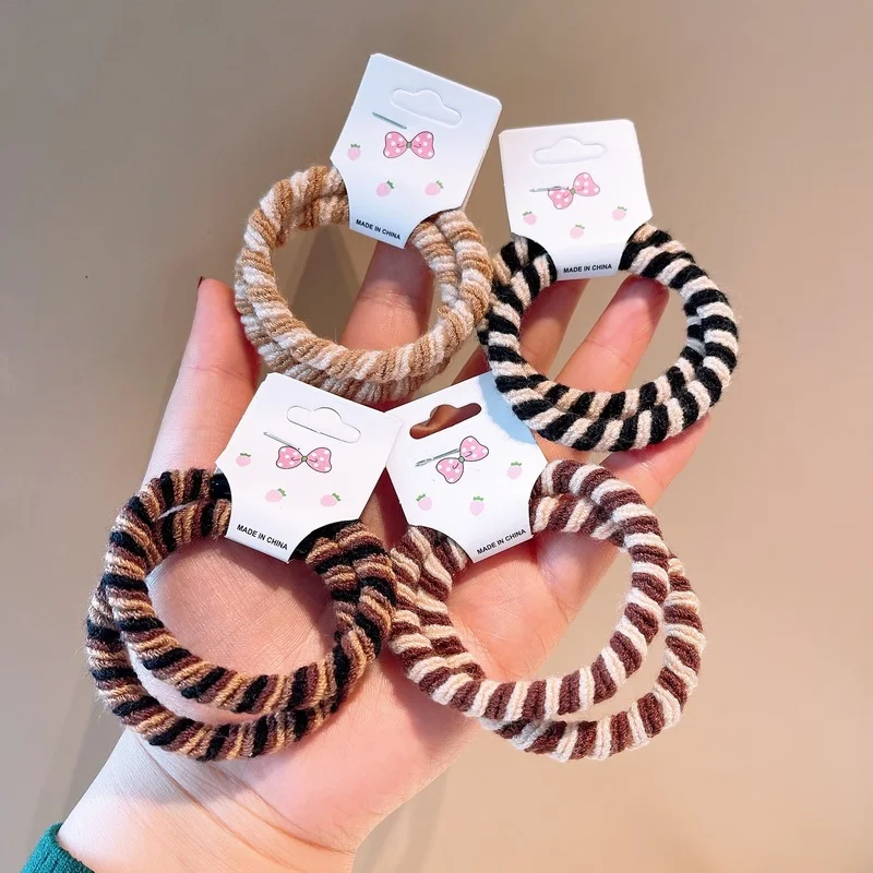 

Korean version of ~ Purchasing retro temperament handmade three-color twist braided hair rope wild basic rubber band jewelry