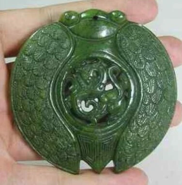 

Beautiful green jade carved dragon pendants in the shape of cicada