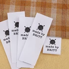 Швейные этикетки, персонализированный бренд, Пользовательский логотип, хлопковые бирки, вязание крючком, белая ткань, шерстяная петля, 20 мм x 60 мм (MD5169)