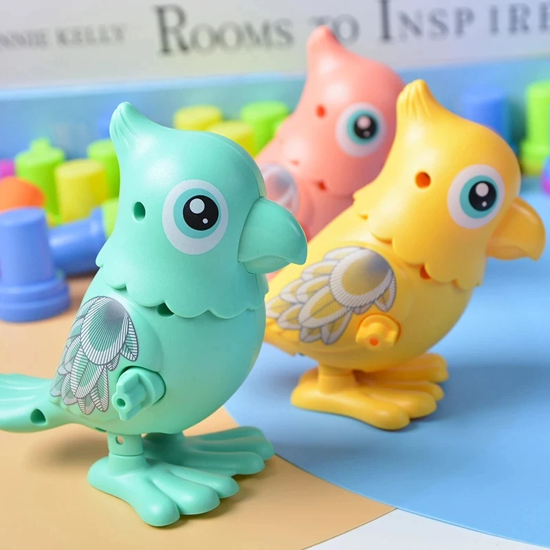 

Children's Clockwork Toy Parrot Fun Gifts Cartoon Toys Jumping Bird Squirrel/ Dinosaur Monkey Wind Up Toys Random Color