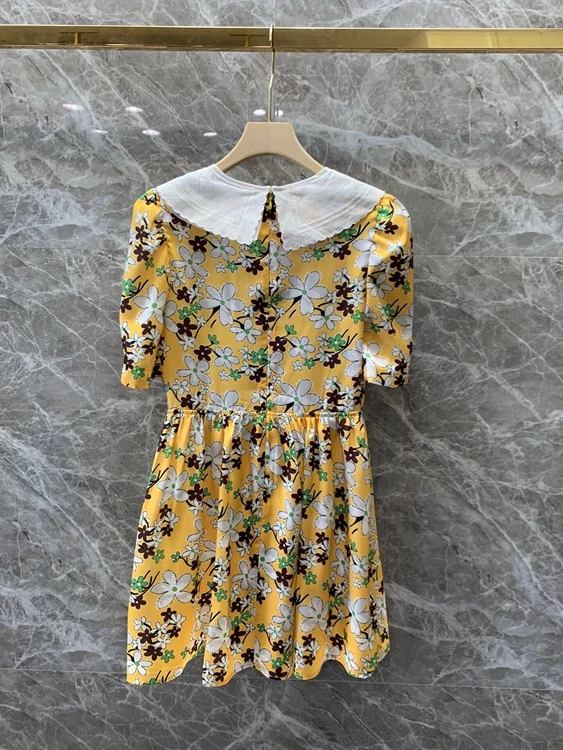 

2021 early spring new women's color matching lapel tie tie knotted neckline printed short-sleeved dress 105
