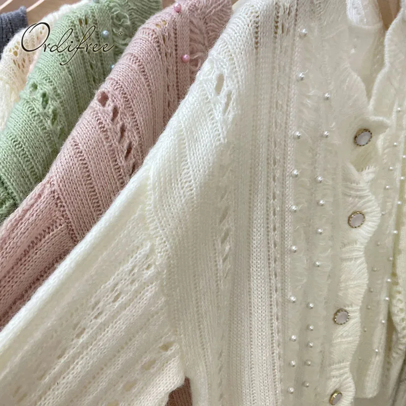 

Ordifree 2021 Autumn Women Knitted Cardigan Vintage Beading Hollow Out White Knitwear Female Sweater Jumpers