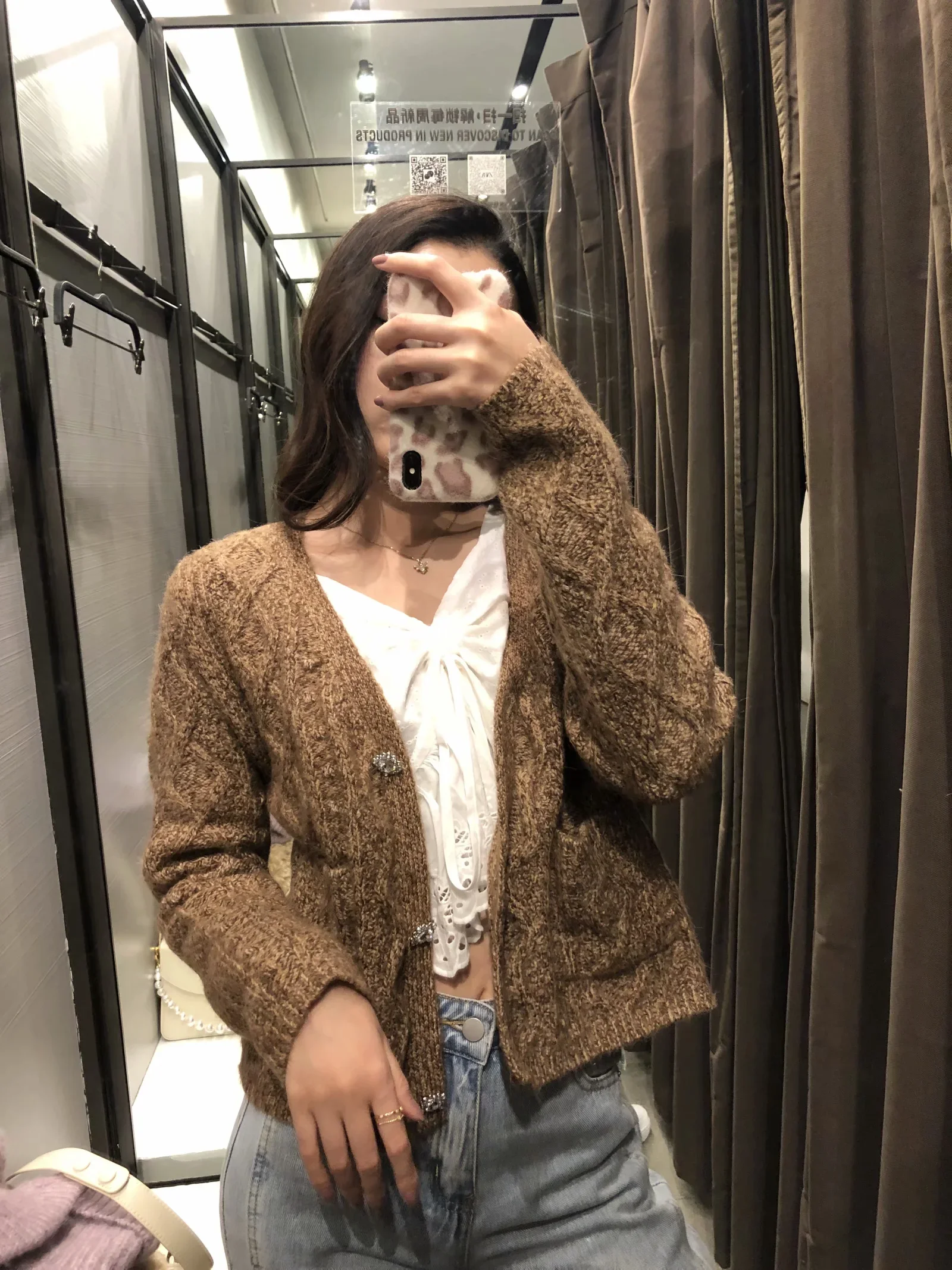 

Costume jewelry button-down cardigan jacket