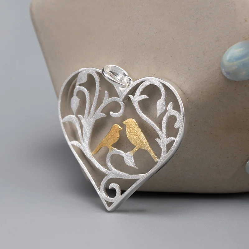 

Женский кулон в виде птицы, серебро пробы