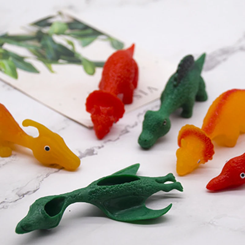 

Catapult Dinosaur Toy TPR Dinosaur Slingshot Elastic Dinosaur Lara Dinosaur Dinosaur Slingshot
