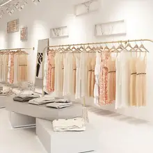 Clothing store display rack womens wear wall childrens wear wall hanging golden clothes hanger floor shelf clothes