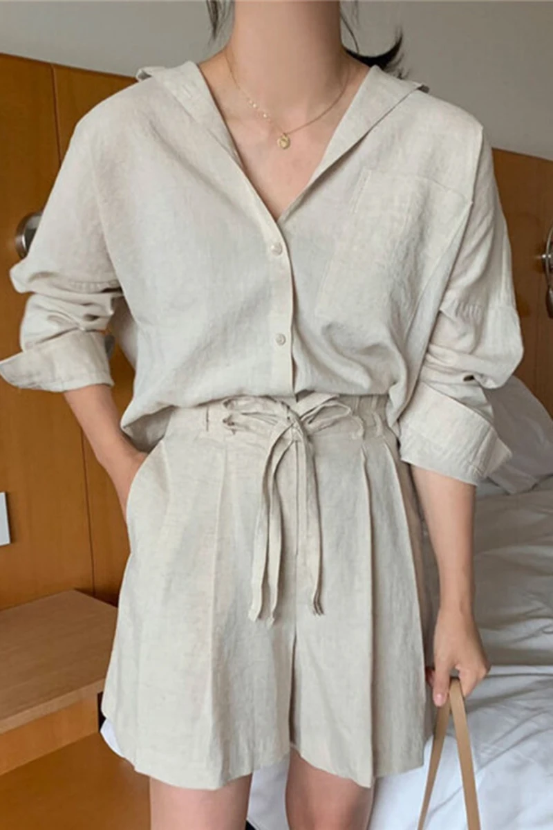 

Simple lapel single-breasted loose long-sleeved shirt + high-waist lace-up wide-leg shorts two-piece female
