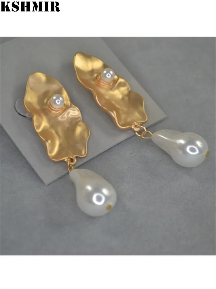 

kshmir Pearl earrings temperament retro gold hammer face irregular texture European texture ornaments 2020