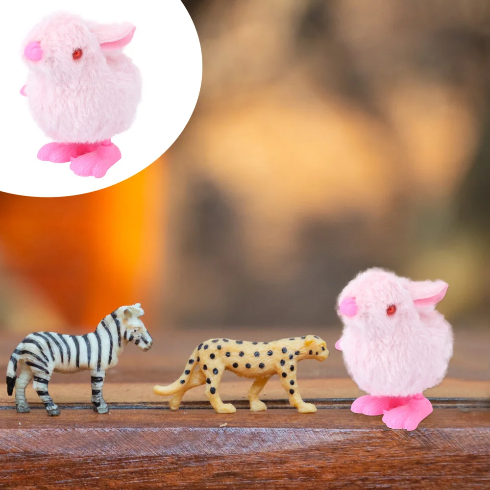 

4pcs Clockwork Stuffed Rabbit Hopping Rabbit Plush Wind Toys Wind-up Rabbit Jumping for Kids (Random Color)