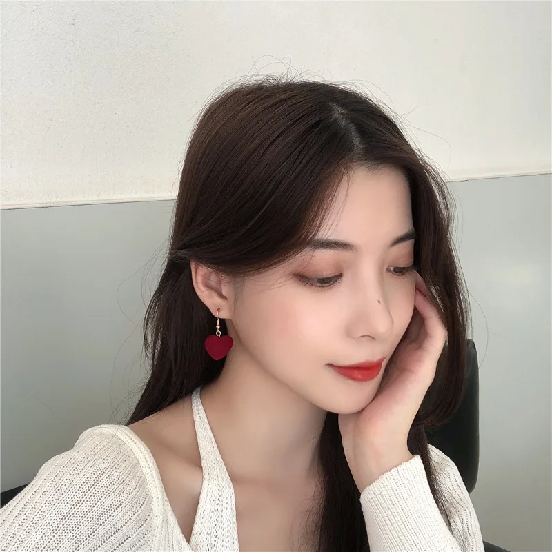 

In 2020 the new velvet peach heart sweet girl hair bulb contracted temperament stud earrings ear clip earrings South Korea