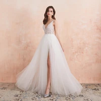 luxury a line wedding dresses tulle v neck beaded gowns sleeveless backless sexy high split robe de tailor made