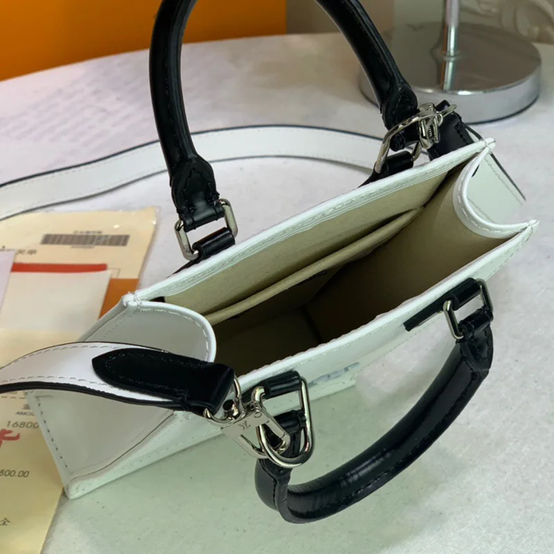 

The new spring 2021 pure color leather lady handbag joker original luxury fashion female bag, purse