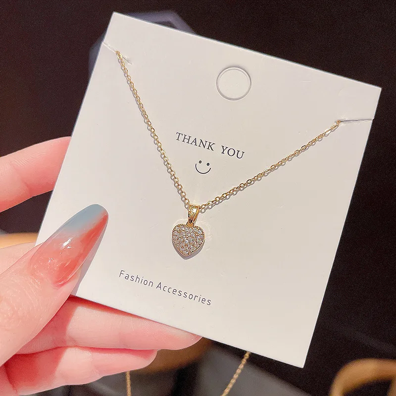 

Wholesale INS Trendy Heart-Shaped Stone Zircon Super Flash Pendant Titanium Steel Necklace Women's Simple Choker Chain Jewelry