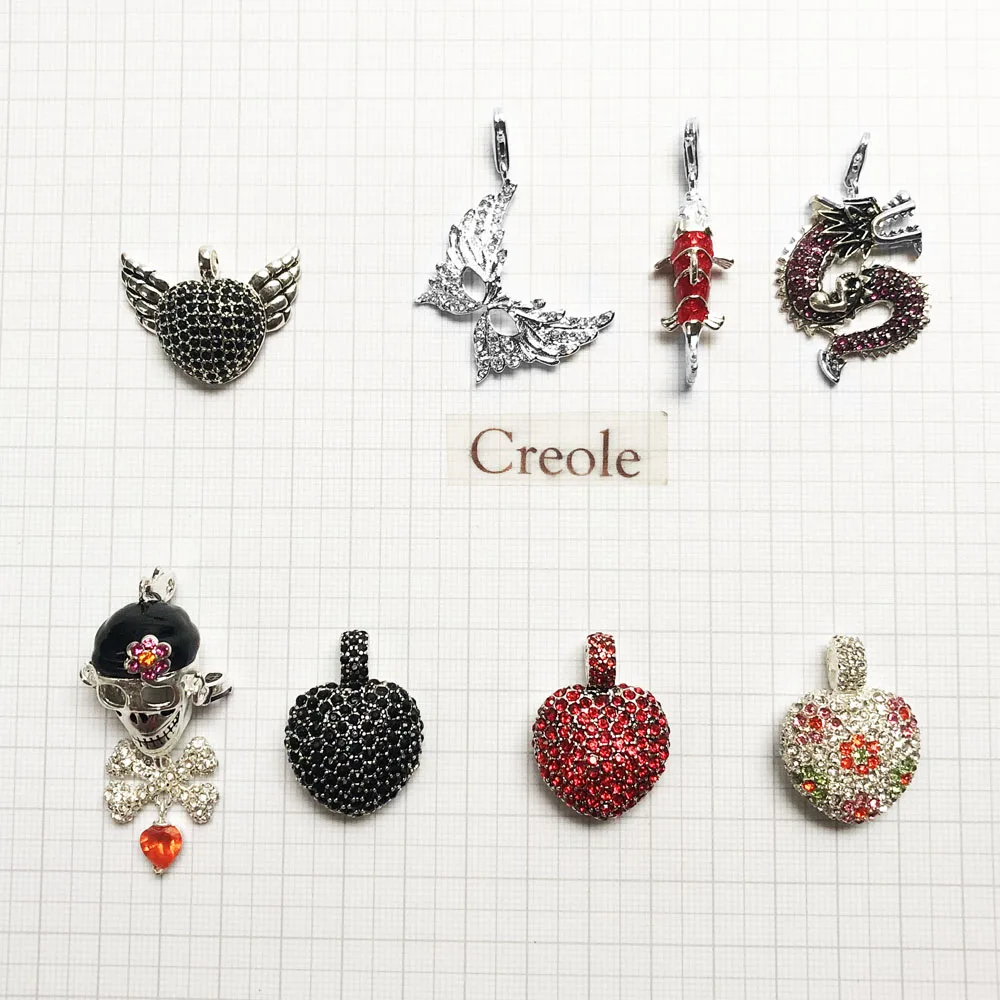 Подвеска с крылатым сердцем маской дракона пиратским черепом красной рыбой