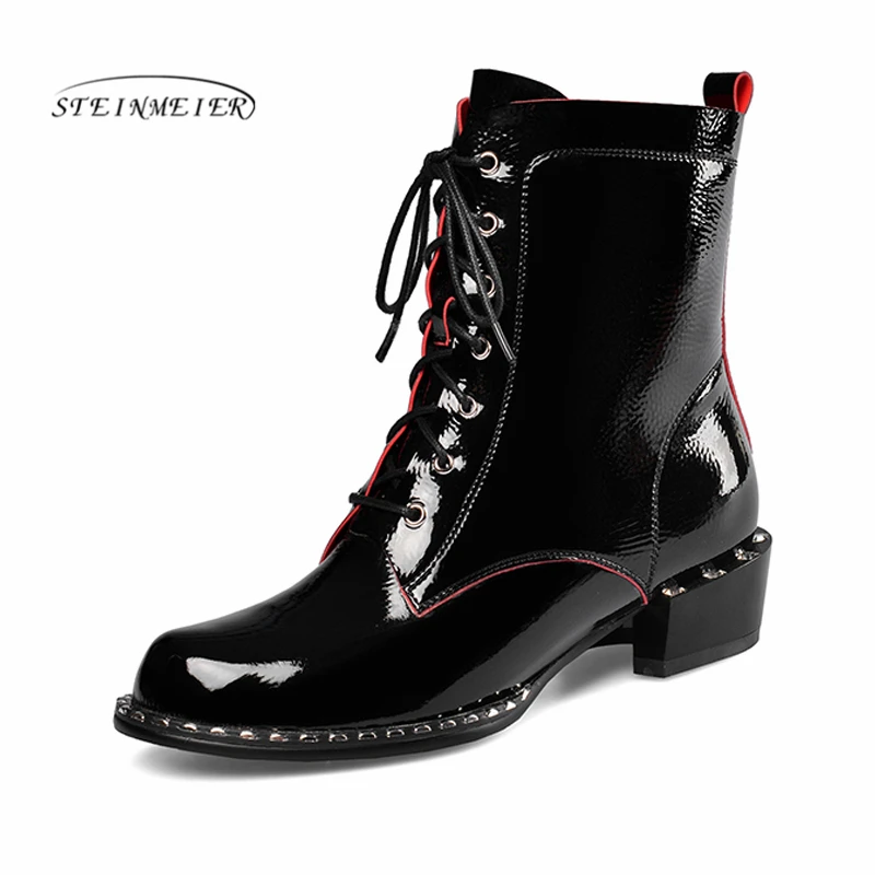 Женские зимние ботинки из натуральной кожи на шнуровке плоской подошве короткие