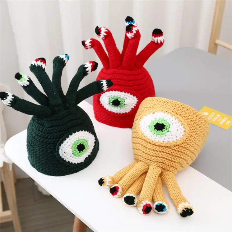 

Шапка-Осьминог шерстяная вечерние заная в форме глаз