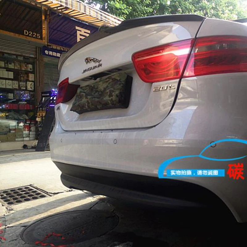 

Auto High Quality Carbon Fiber Rear Lip Spoiler Trunk Boot Wing 1Pcs Car Styling For Jaguar Spoiler XE 2015 2016 2017