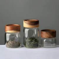 glass storage canister with lid clear airtight jar with wooden cover for serving tea coffee spice modern decorative small bottle