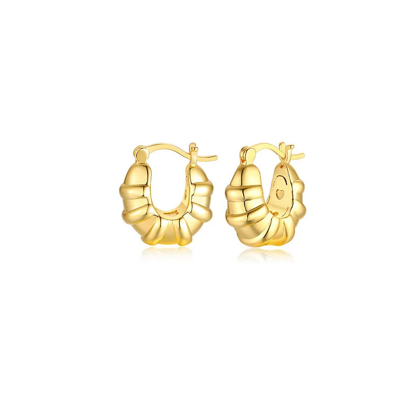 

Niujiaobao cute song bread hollowed out earrings with holes in winter