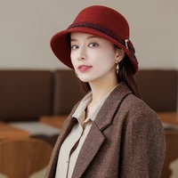 2022 middle aged and old lady warm outdoor tourism all sheep cloth bowknot is the new short basin of fashion hat hat luxury cash