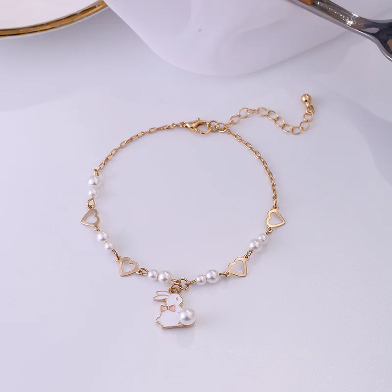 

Sweet and lovely small white rabbit simple pearl bracelet, heart-shaped girl student fashion woman bracelet