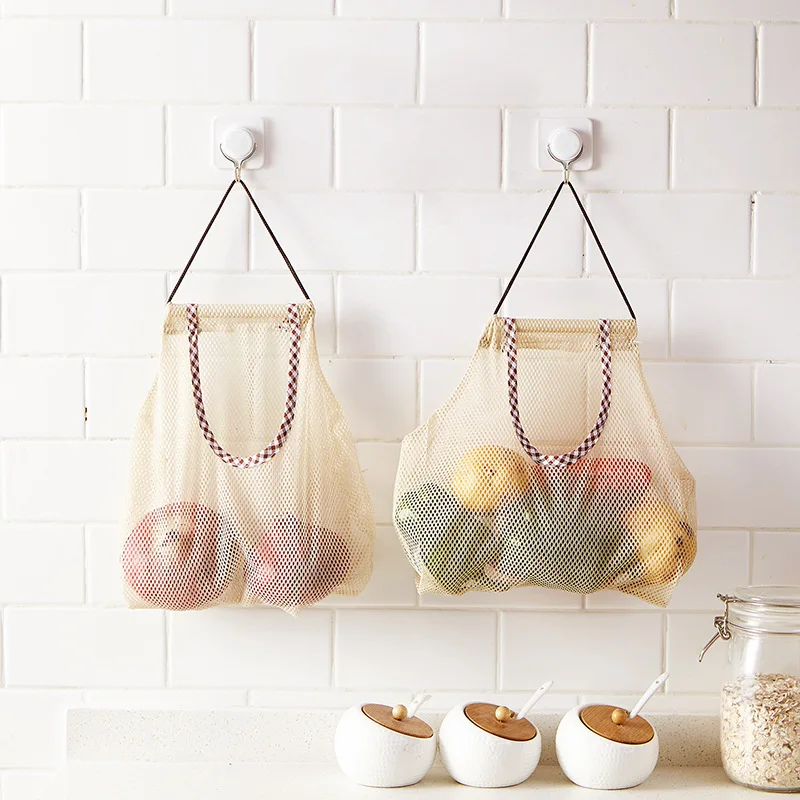

Kitchen Vegetable Mesh Storage Bags Onion Potato Storage Hanging Bags Reusable Hollow Breathable Kitchen Garlic Ginger Mesh Bag